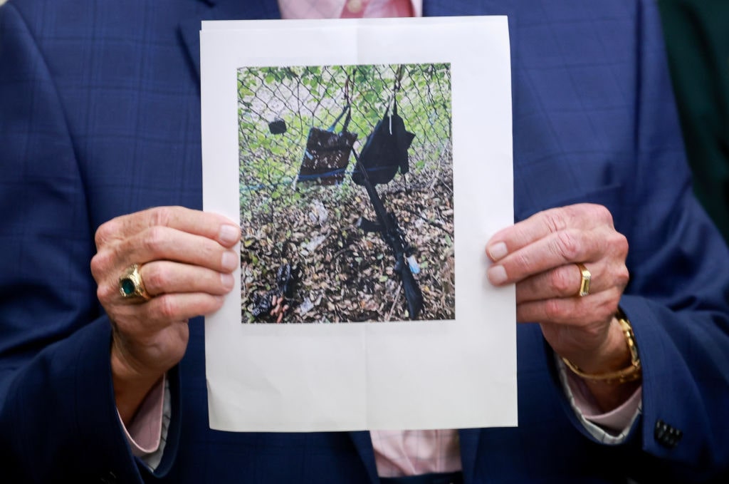 Shots Reportedly Fired Near Trump Golf Course Where The Former President Was PlayingWEST PALM BEACH, FLORIDA - SEPTEMBER 15: Palm Beach County Sheriff Ric Bradshaw holds a photograph of the rifle and other items found near where a suspect was discovered during a press conference regarding an apparent assassination attempt of former President Donald Trump on September 15, 2024 in West Palm Beach, Florida. The FBI and U.S. Secret Service, along with the Palm Beach County Sheriff's office, are investigating the incident, which the FBI said "appears to be an attempted assassination of former President Trump' while he was golfing at Trump International Golf Club. (Photo by Joe Raedle/Getty Images)