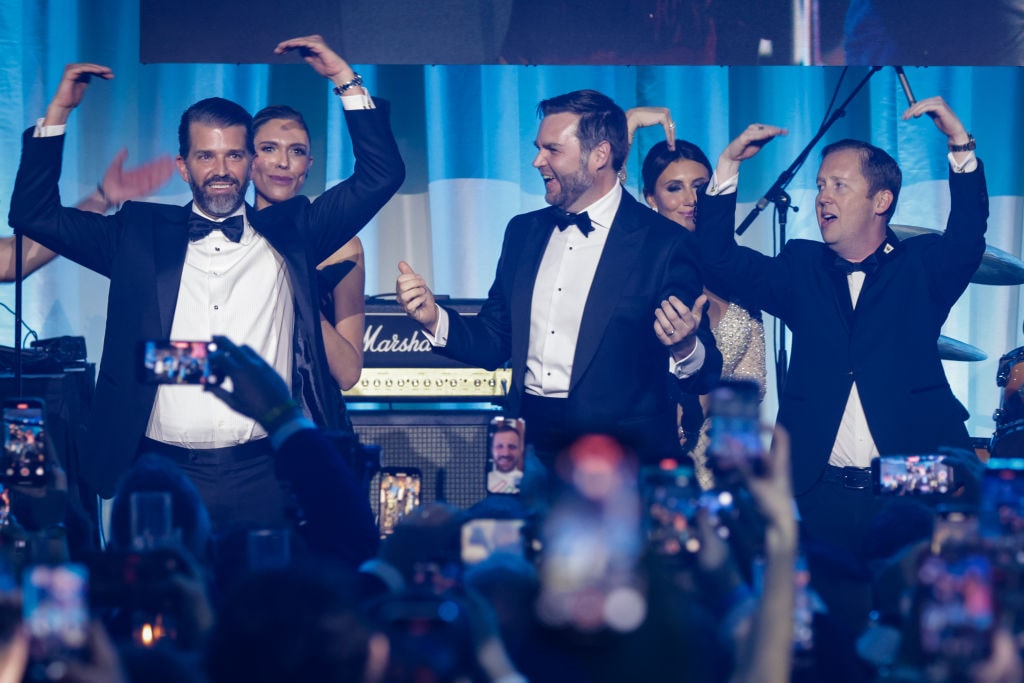 Turning Point Inaugural-Eve Ball Held In Washington, D.C.WASHINGTON, DC - JANUARY 19: (L-R) Donald Trump Jr., Bettina Anderson, U.S. Vice President-elect JD Vance, and Sergio Gor dance on stage as The Village People perform YMCA during the Turning Point USA Inaugural-Eve Ball at the Salamander Hotel on January 19, 2025 in Washington, DC. Donald Trump will be sworn in as the 47th U.S. president on January 20. (Photo by Samuel Corum/Getty Images)